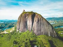 The rock of guatape, is a landmark inselberg in colombia. La Piedra Del Penol The Big Guatape Rock Colombia Journey Era