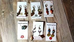 Pierce two holes in the finished card. How To Design Your Own Earring Cards With Canva Easy Earring Cards Earring Cards Crafts Diy Earring Cards