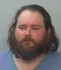 Suspect in double killings pleads guilty