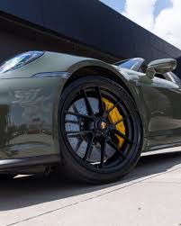 Image result for Black Olive 2025 Porsche