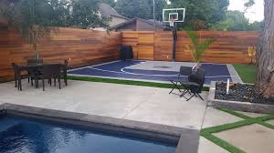 Tired of repainting and resealing the concrete around your backyard pool and basketball court? Pin On Backyard Basketball Courts