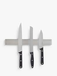 A magnet for hanging knives on the wall, or for storing knives wherever they are used in the kitchen. John Lewis Partners Wall Mounted Stainless Steel Magnetic Knife Rack Chrome