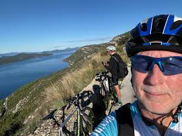 How much SoC is used when an electric car is not in use?