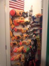 Get those builky plastic guns off the floor with the easy diy nerf gun storage idea! Nerf Gun Storage Ideas