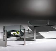 In occasional tables, darker tones and heavier materials, like a wood coffee table, take up more visual space than, say, a glass coffee table. Buy A Black Glass Coffee Table In Modern Design Dreieck Design