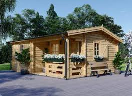 Blockbohlenhaus Und Blockhaus Aus Holz Online Kaufen Blockbohlenhaus Haus Strandhauser