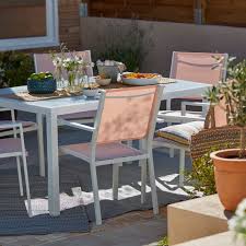 The Barbana 4 Seater Metal Table Set Looks Lovely In More Contemporary Spaces The Pastel Tones Of Metal Armchair Outdoor Dining Spaces Outdoor Furniture Sets