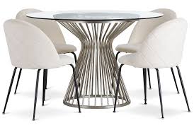 This mixed media dining table features a tempered glass top that showcases a gorgeous hexagonal shaped chrome base. Munich Silver Glass Table 4 Upholstered Chairs Upholstered Chairs Glass Table Table