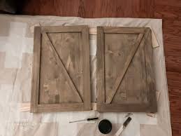 We attached an additional 1×2 to the 2×3 frame right behind our top face frame in order to make sure the bolts were screwed into something thicker than just the face frame for added stability. Diy Farmhouse Media Console Table The Turquoise Home