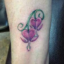 Bleeding Hearts Bleeding Heart Flower And Types Of Flowers On Wrist Tattoos For Guys Flower Wrist Tattoos Heart Flower Tattoo