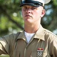 Rct. Austin Zirbes, Platoon 2030, adjusts the helmet