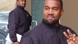 Kendall Jenner attempts to hide her face a day after sister Kim Kardashian  celebrates arrival of baby number three