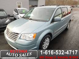 Image result for Light Ice Blue 2009 Town Car