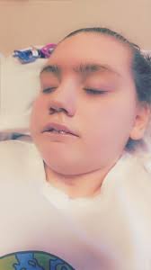 Playing with her hair while she's sleeping. Last year Vaeh had really short  hair. Amd now her hair is just so healthy and thick. Even