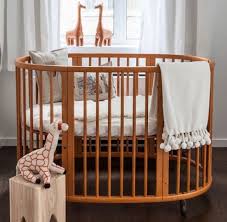 There seems to be unlimited choices for crib types from classic styles to traditional styles. Affordable Round Baby Crib Designs Home Interiors Baby Crib Designs Round Baby Cribs Crib Design