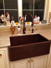 french country kitchen with copper farm