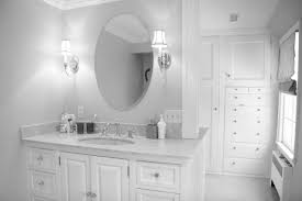 Bathroom Ideas Cheap Oval Bathroom Mirrors With Two Wall Sconces Above Single Sink Abthroom Va Oval Mirror Bathroom Wall Sconces Bedroom Bathroom Wall Sconces