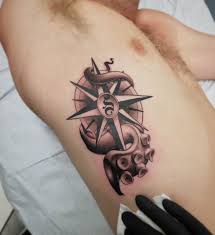 On the bottom corner, there is a cutout of a map, perhaps of his home or some other place of special significance in his life. Compass Tattoo Designs Ideas And Meanings August 2021