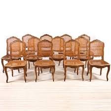 Set Of Twelve Antique French Louis Xv Style Dining Chairs In Walnut With Caning C 1880 Antique Dining Chairs French Antiques Antique Side Chairs