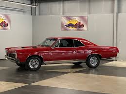Image result for Ruby Red 1967 AC Cars