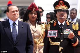 Aisha gaddafi believes that gaddafi is not in libya, he is in the hearts of libyans. More Make Up And Hair Dye Than His 40 Virgin Bodyguards But Gaddafi Is Still A Murderous Menace Daily Mail Online