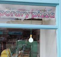 Newly restored and repainted shop front with reverse painted ...