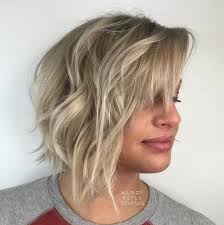 Chic highlighted layered hairstyle for short cut hair. 35 Short Layered Haircuts That Are Trending In 2021