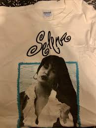Selena shows her boutique / clips inside her boutique instagram: Awesome Shirt I Ve Had Forever Anyone Have Any Info On It Font Makes Me Think It S A Selena Boutique Item Selenaquintanilla