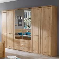 Je nachdem wählst du die. Kleiderschrank Aus Holz Mit Spiegel Und Schubalden Trikomo