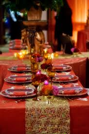 Indian Inspired Wedding Table Rentals By Barclay Event Rentals Photo By The Art Of Joy A Reception Table Settings Wedding Table Centerpieces Wedding Table