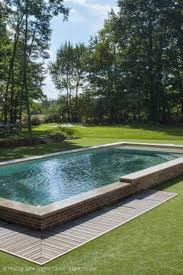 une piscine semi enterree un bon compromis entre deux types de piscines guide piscine fr piscine semi enterree piscine et jardin plan piscine