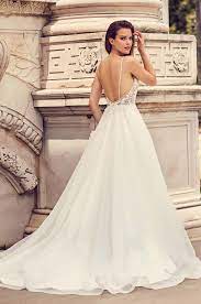 Fit and flare skirt with inverted seam at back of train. Mikaella 2225 Vows Bridal