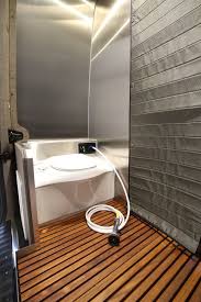 Pop up camping toilet/shower tents. Camper Van Sleeps Four And Hides A Clever Bathroom Curbed