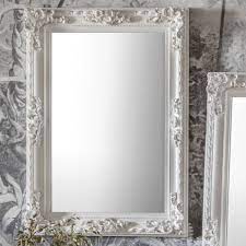 Give your wall or bathroom the finishing touch with this framed, wall mounted mirror. Antique White Wall Mirror Exclusive Mirrors