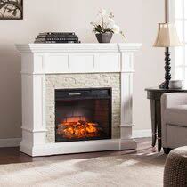 They're perfect if you want something that gives the aesthetic of a cozy fire with a little extra heat. Corner Stone Fireplace Wayfair