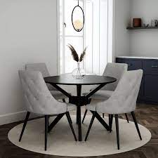 Round table and grey chairs in outdoor patio furniture design sets. Black Round Dining Table With 4 Grey Woven Fabric Dining Chairs Furniture123
