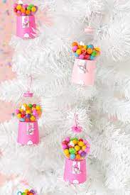 Each cut of the scissors, pull and stick of the tape pieces, and lacing of the ribbon, use muscles in your child's fingers and hands that help develop handwriting muscles and motions too! Diy Candyland Christmas Decorations Ornaments The Budget Decorator