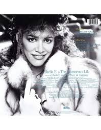 Watch the music video and discover trivia about this classic pop song now. Sheila E The Glamorous Life Teal Vinyl Pop Music Toronto