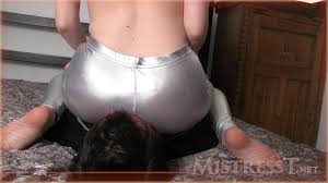Doctor gets face sat by angry patient. Mistress T Facesitting In Shiny Silver Leggings