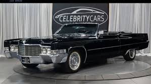 Image result for Black 1969 Cadillac