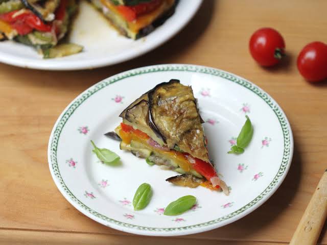 A slice of Roasted Vegetable Torte, AI generated