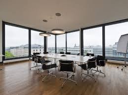 Mesmerizing Office Meeting Room With Classy Black Leather Swivel Chairs On Combined Rectangle Meeting Table And Double Round Pendant Lamp Also Modern Screen Pro