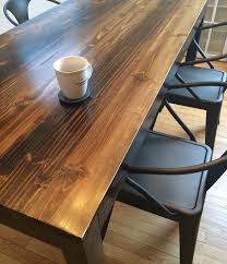 This contemporary custom natural edge cherry slab dining room table has hand carved edges. Chicago Fire Parsons Table Dining Table Torch Wood Parsons Table