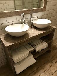 This attractive wood vessel sink show off the beauty of wood in an unexpected setting. Rustic Wooden Bathroom Vanity Cabinet Vanity Bathroom Rustic Bathroom Vanity Reclaimed Woo Wooden Bathroom Vanity Wood Bathroom Vanity Rustic Bathroom Sinks