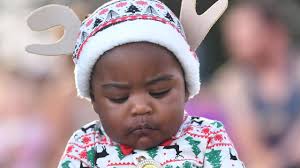 Adorable bubs and kids dressed as reindeers, elves, angels at Townsville  Christmas in the Park