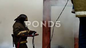 Firefighters Extinguishes A Fire In A Building Stock Footage Ad Fire Extinguishes Footage Firefighters Firefighter Fire Stock Footage