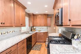 Rta wood cabinets cnc elegant nutmeg shaker kitchen cabinets is the perfect clean modern look with a range of desired tastes. Maple Nutmeg Cabinets In Kitchen Remodel C T Gabbert Remodeling And Construction