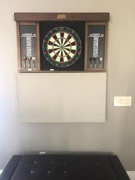 Self healing bristle dartboards are some of the longest lasting boards on the market, since the holes close up after each dart is removed. Barrington 40 Dartboard Cabinet Set Led Lights Steel Tip Darts Brown Black Walmart Com Walmart Com