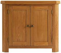 This cabinet features oak door construction with raised panel door design for a stylish decorative touch. Oak Corner Cabinet Renton Rugs