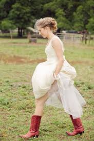 Shop country wedding dresses with a rustic, western, or even desert boho spirit. Texas Ranch Wedding By The Nichols Red Cowgirl Boots Red Wedding Dresses Cowgirl Boots